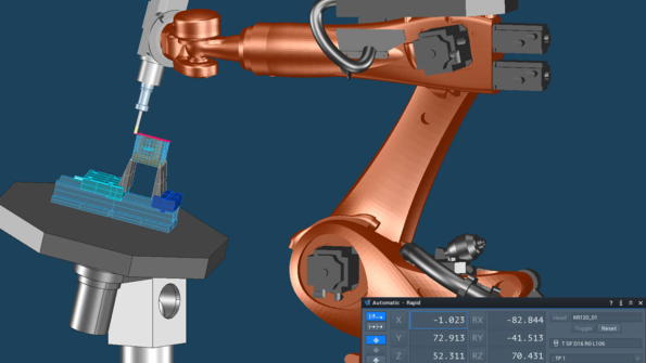Programmazione robot a 6 assi per la lavorazione di un componente su una tavola rotante a movimento sincrono con due assi supplementari